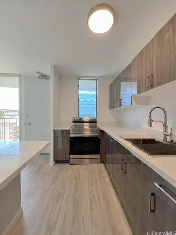 a bathroom with a double vanity sink toilet and shower