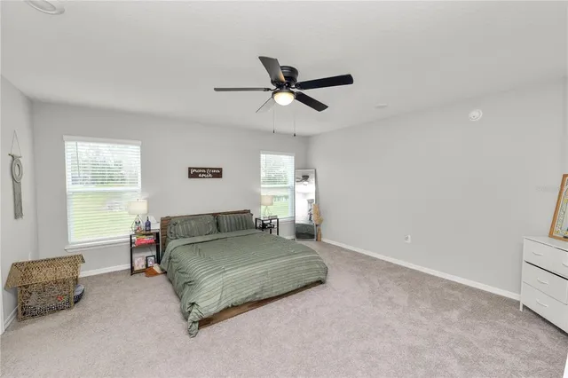a living room with a couch and a window