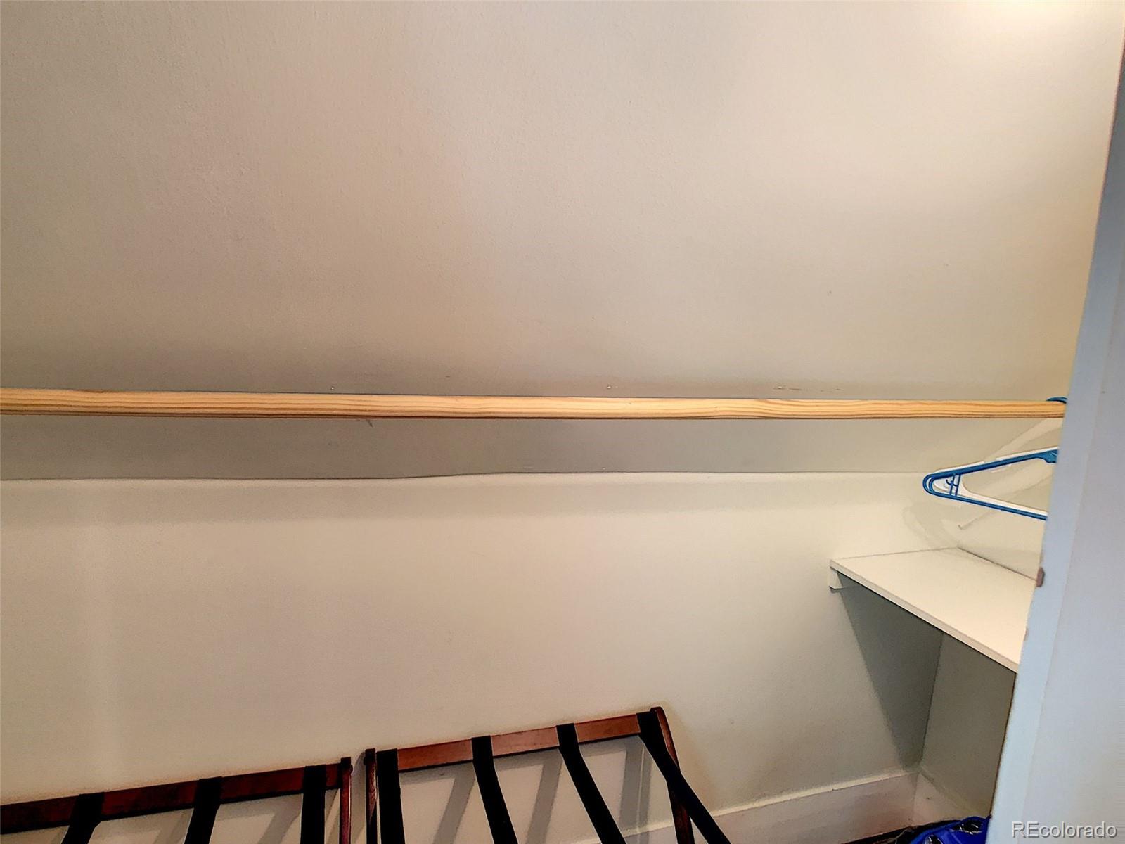 124 South Sherman Street, Unit UPSTAIRS Denver, CO 80209 - Photo 25 of 35 a view of a room with racks on the wall