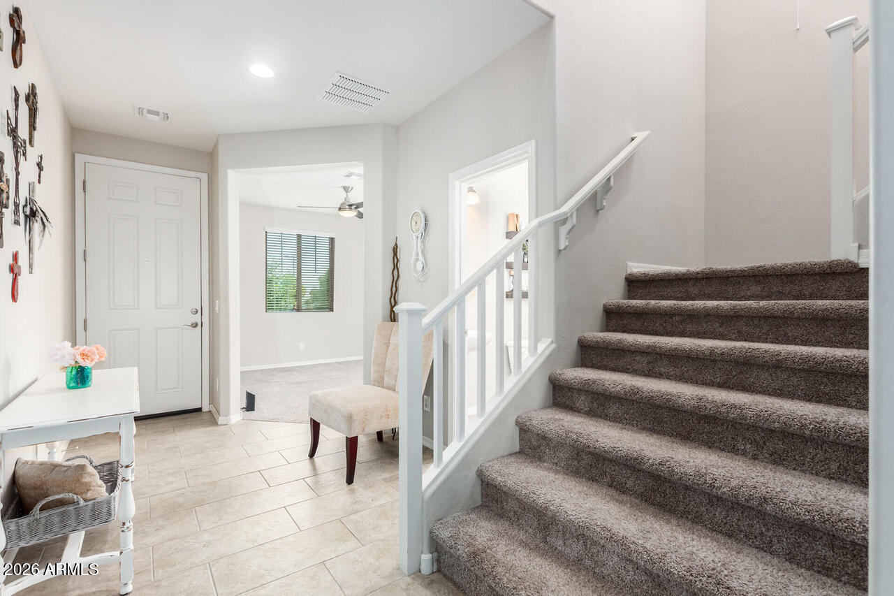 21188 West Almeria Road Buckeye, AZ 85396 - Photo 26 of 43 a view of entryway and hall
