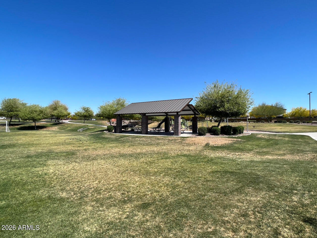 21188 West Almeria Road Buckeye, AZ 85396 - Photo 39 of 43 a view of a lake with a big yard