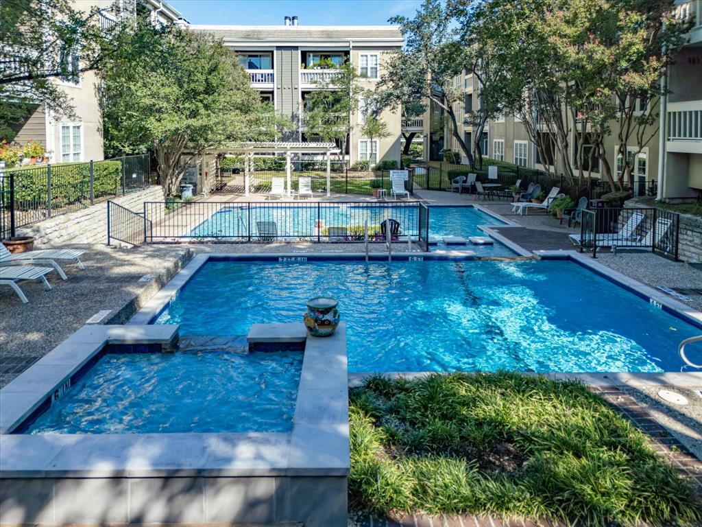 5310 Keller Springs Road, Unit 332 Dallas, TX 75248 - Photo 30 of 39 View of swimming pool with a patio, a pool with connected hot tub, and a pergola