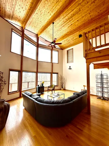 a bathroom with a granite countertop sink and mirror