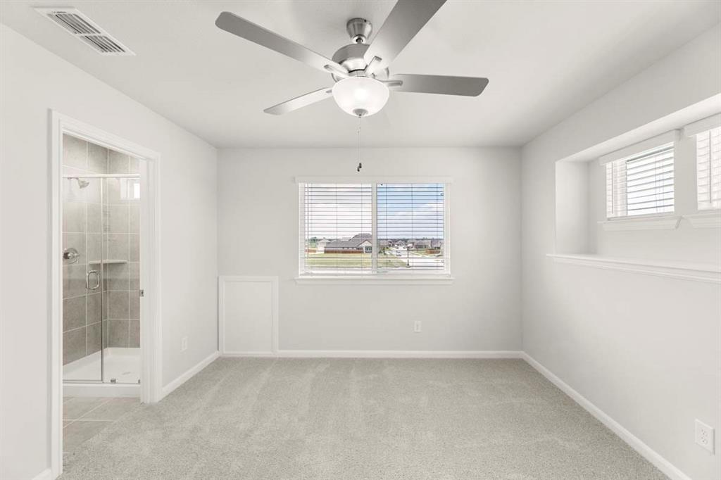 451 Sweet Spring Drive Lavon, TX 75166 - Photo 12 of 33 12-451-sweet-spring-lavon-tx-primary-bedroom