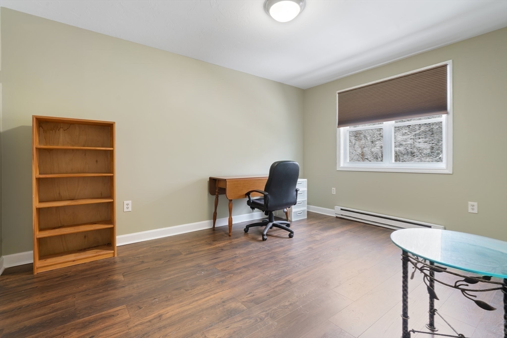 46 Gibbs Street, Unit 4D Worcester, MA 01607 - Photo 11 of 21 a view of a workspace with furniture and a window