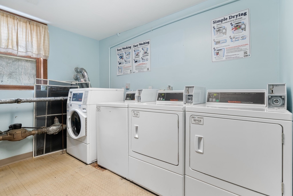 46 Gibbs Street, Unit 4D Worcester, MA 01607 - Photo 17 of 21 a utility room with dryer and washer