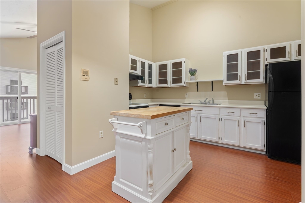 46 Gibbs Street, Unit 4D Worcester, MA 01607 - Photo 3 of 21 a kitchen with stainless steel appliances granite countertop a stove a sink and a refrigerator