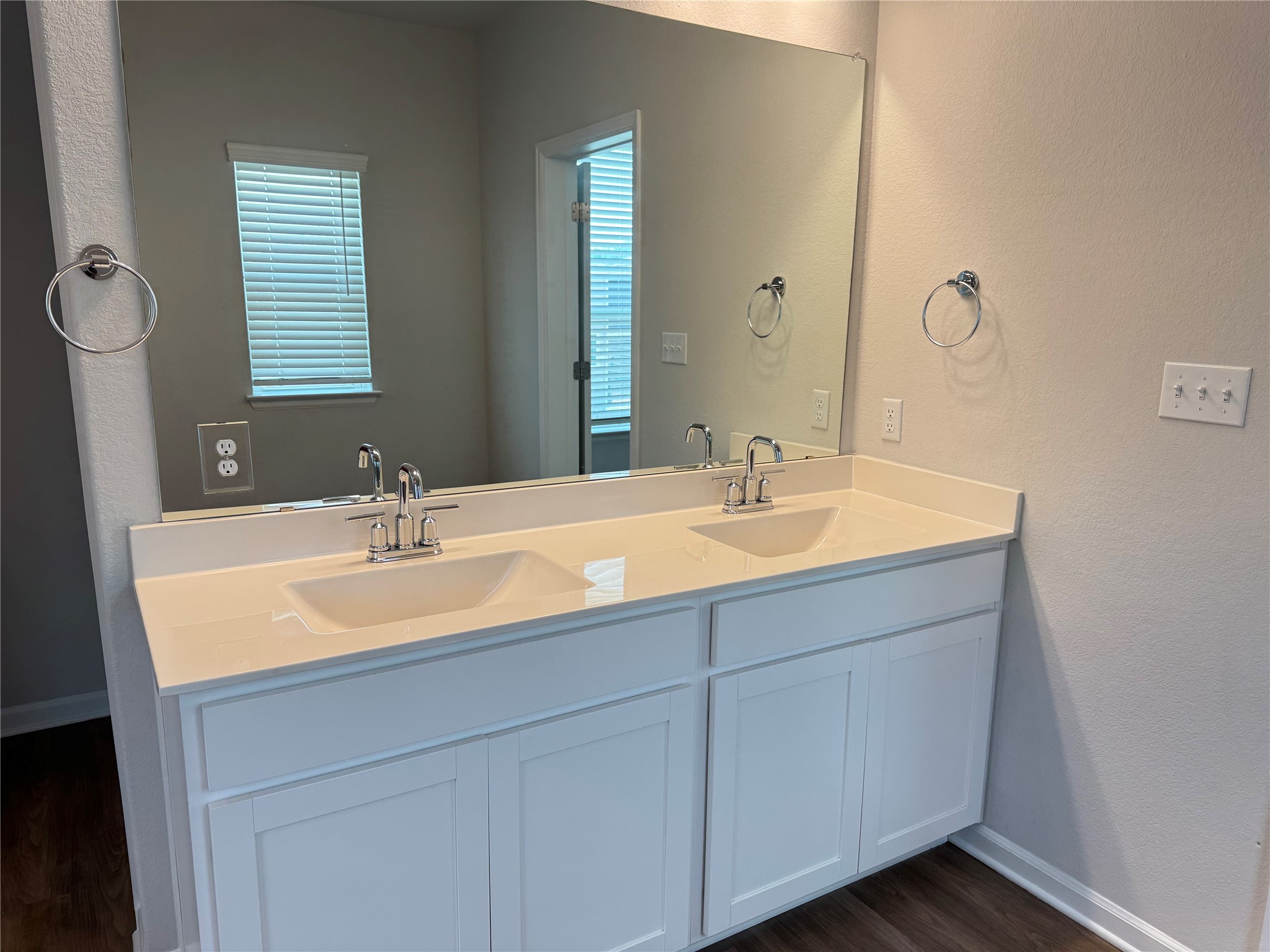 3000 Chisholm Trail Road, Unit 41 Round Rock, TX 78681 - Photo 11 of 28 A spacious double vanity and large mirror create a functional and stylish bathroom.