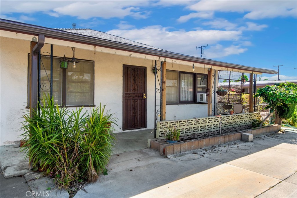 12128 161st Street Norwalk, CA 90650 - Photo 3 of 18 a front view of a house