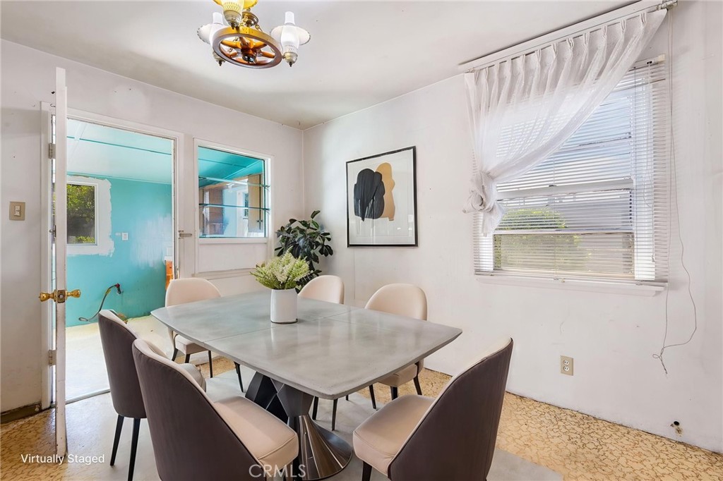 12128 161st Street Norwalk, CA 90650 - Photo 7 of 18 a dining room with furniture and window