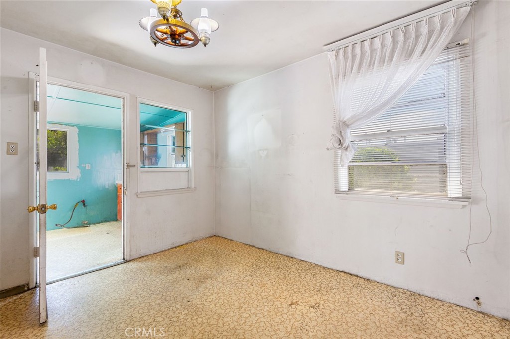12128 161st Street Norwalk, CA 90650 - Photo 8 of 18 a view of an entryway with a window
