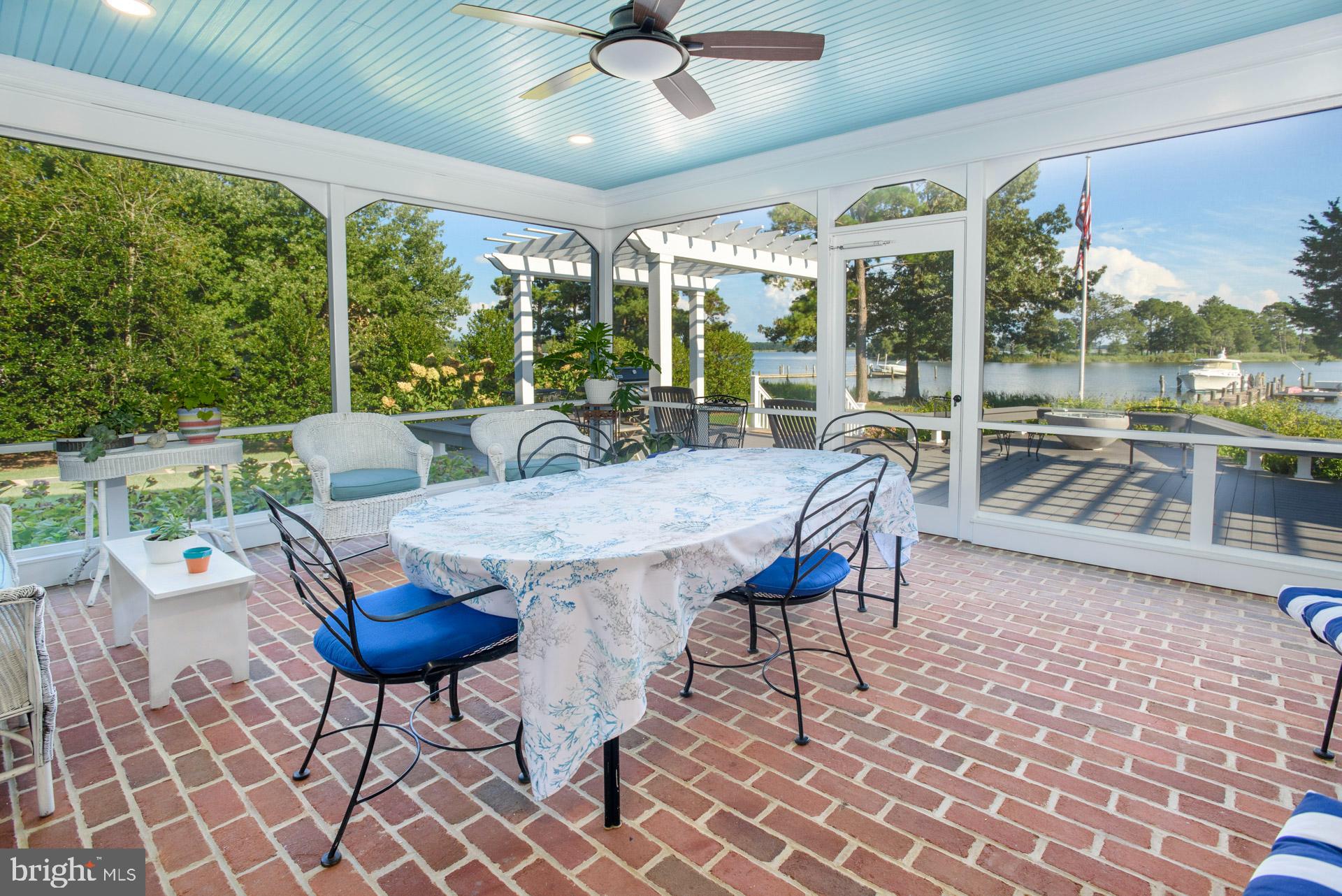 26631 North Point Road Easton, MD 21601 - Photo 31 of 50 large screened porch off kitchen & river room