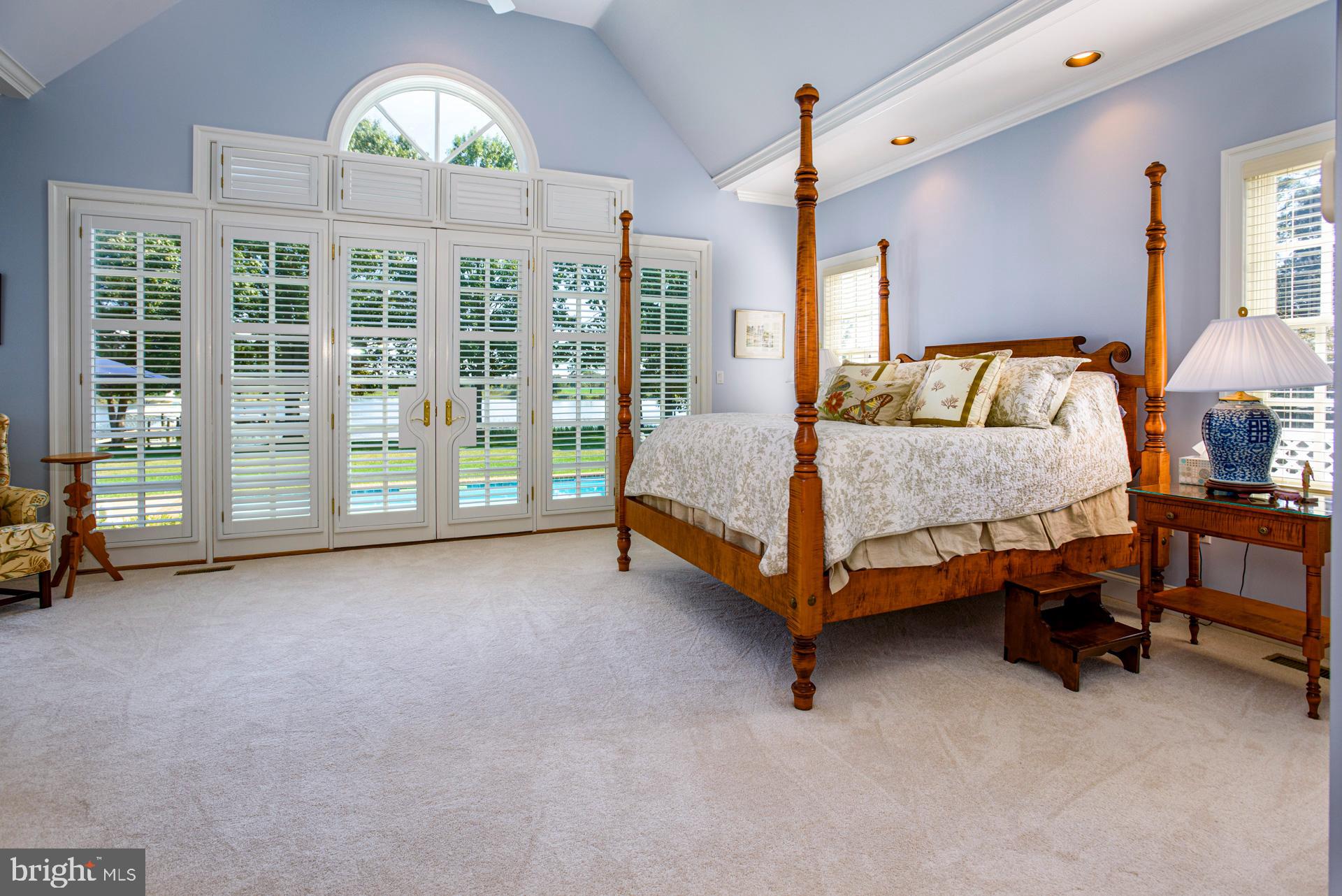 26631 North Point Road Easton, MD 21601 - Photo 36 of 50 Primary bedroom w/ cathedral ceiling; french doors