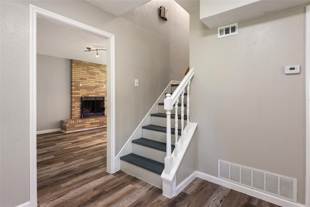 2820 Bois D'Arc Street Commerce, TX 75428 - Photo 4 of 40 a view of entryway and hall with wooden floor