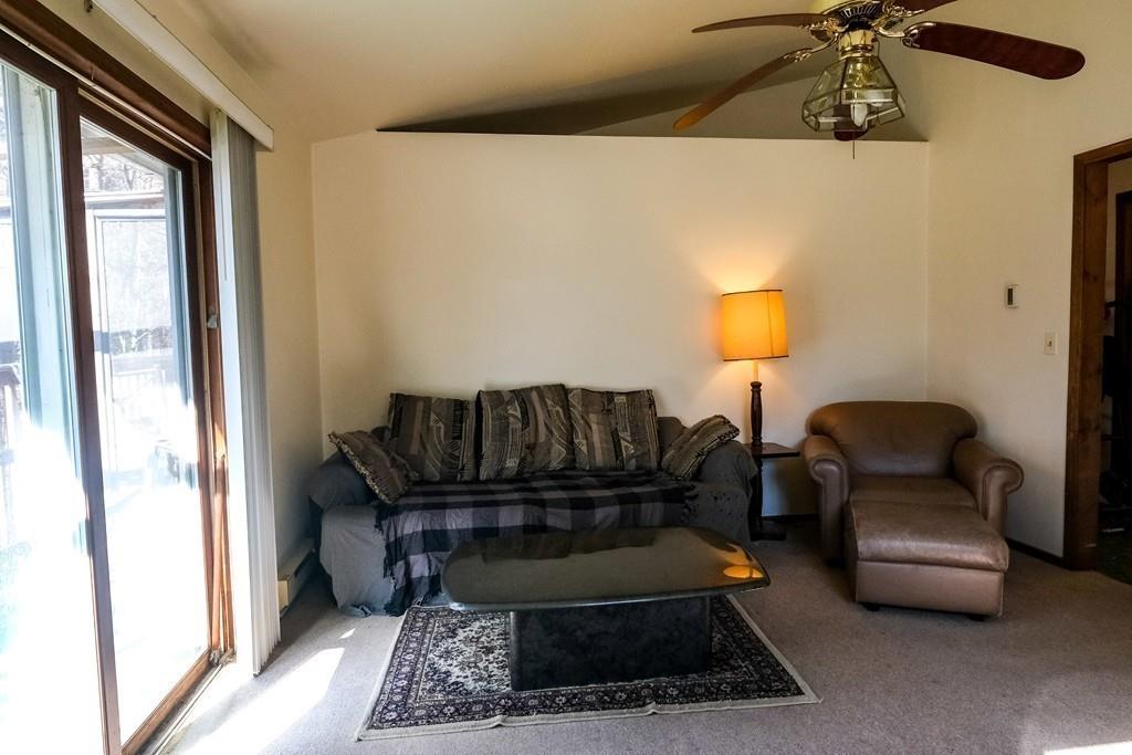 389 Torrey Road Southbridge, MA 01550 - Photo 3 of 15 a living room with furniture and a rug
