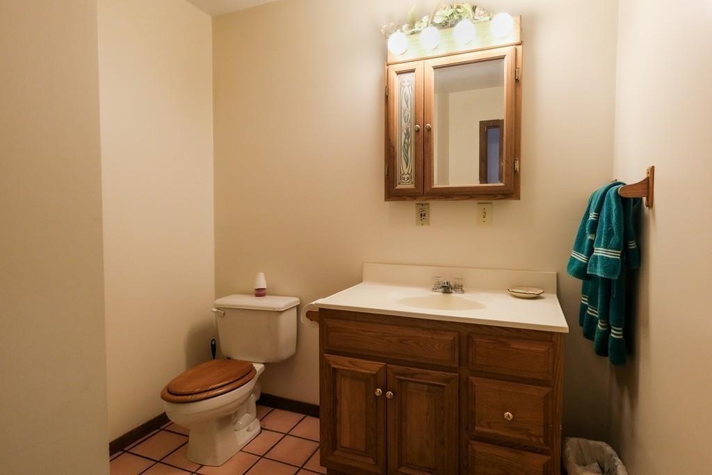 389 Torrey Road Southbridge, MA 01550 - Photo 6 of 15 a bathroom with a toilet sink and mirror