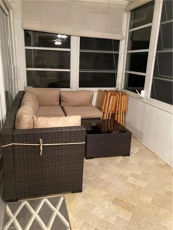 a view of a golf course with chairs