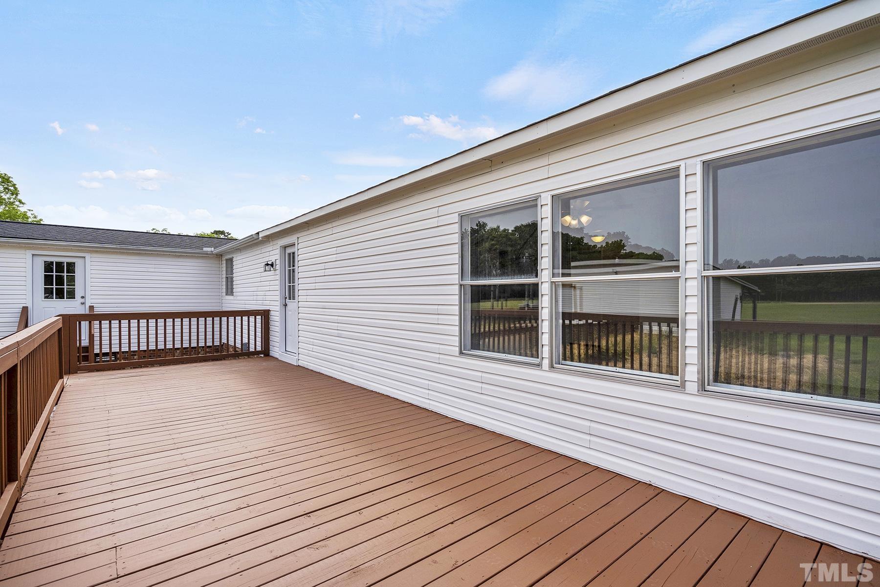 105 Rains Crossroads Road Selma, NC 27576 - Photo 25 of 30 a view of a balcony with wooden floor