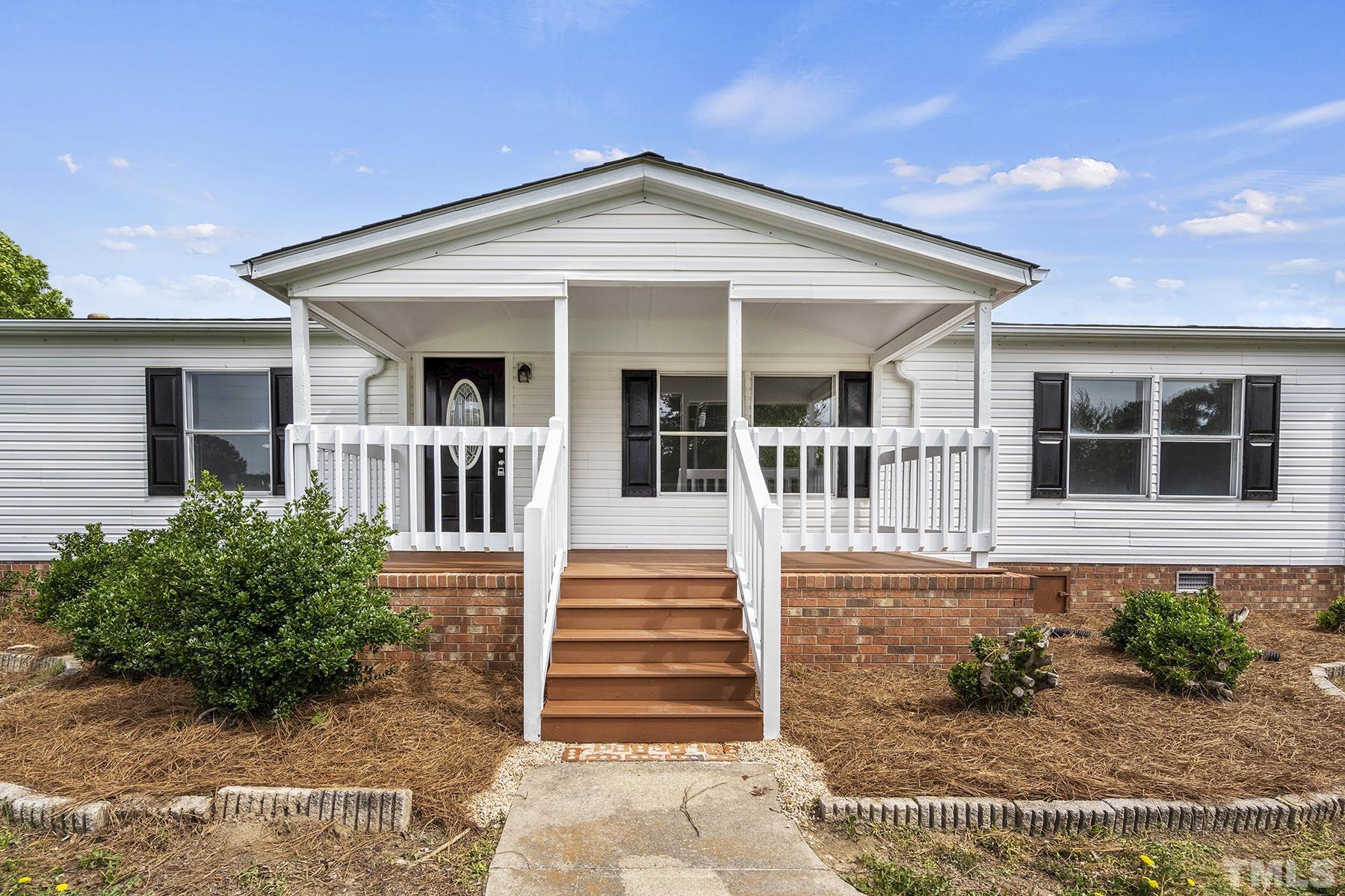105 Rains Crossroads Road Selma, NC 27576 - Photo 4 of 30 front view of a house