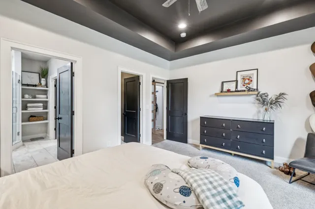 a view of a chair and table in backyard of the house