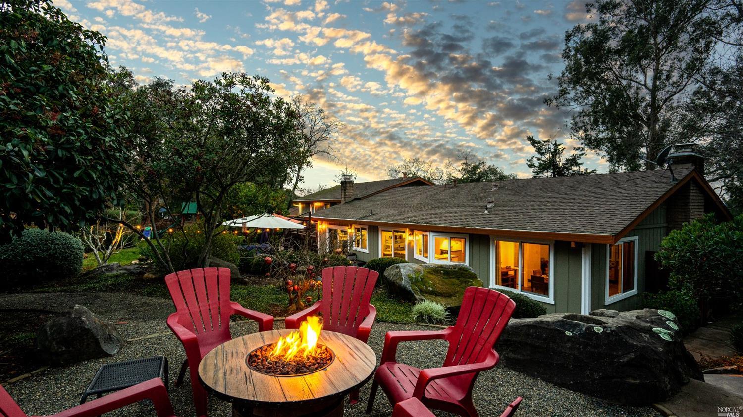 2580 Del Rosa Avenue Santa Rosa, CA 95404 - Photo 1 of 1 a view of a patio with couches chairs and a fire pit