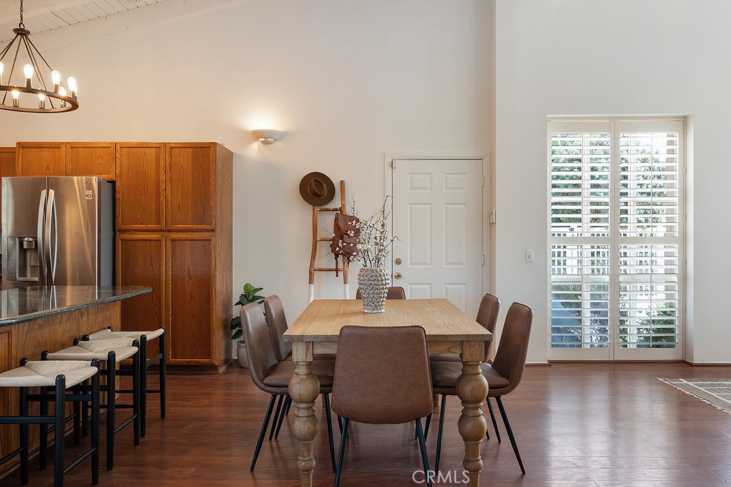 235 Spinks Canyon Road Duarte, CA 91010 - Photo 19 of 62 a view of a dining room with furniture window and wooden floor