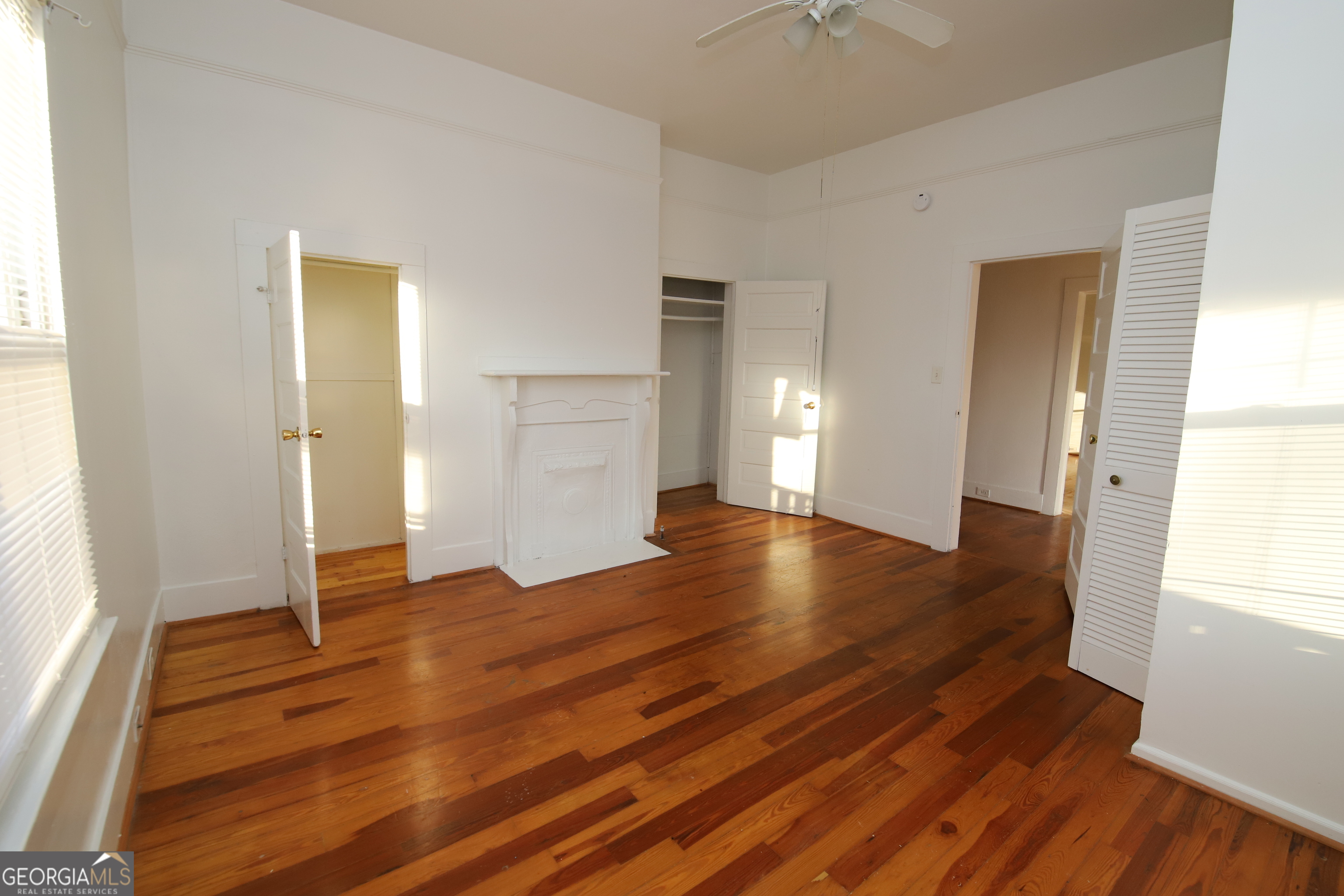 201 Jennings Street Valley, AL 36854 - Photo 11 of 24 a view of empty room with wooden floor and fan