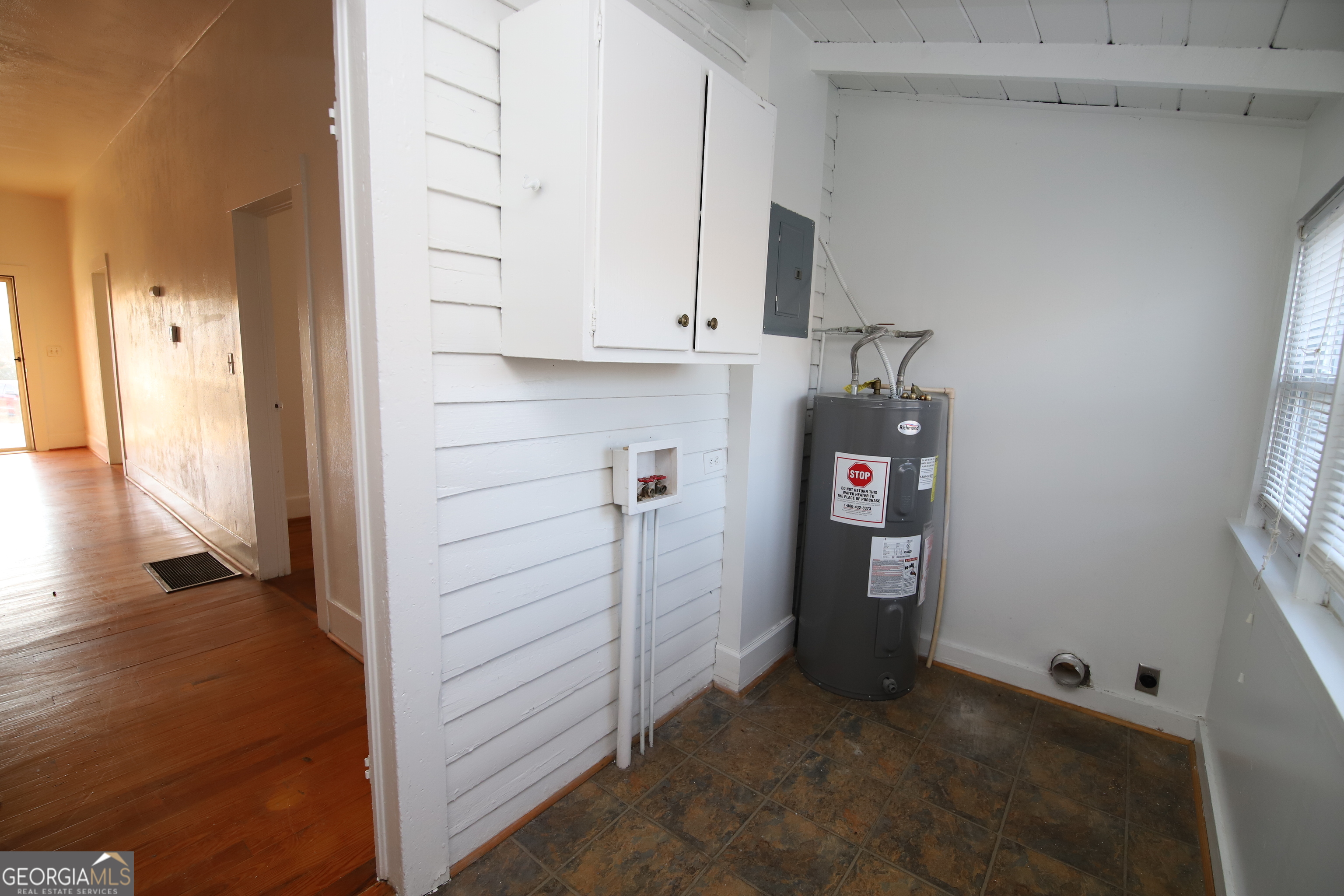 201 Jennings Street Valley, AL 36854 - Photo 19 of 24 a view of walk in closet with window