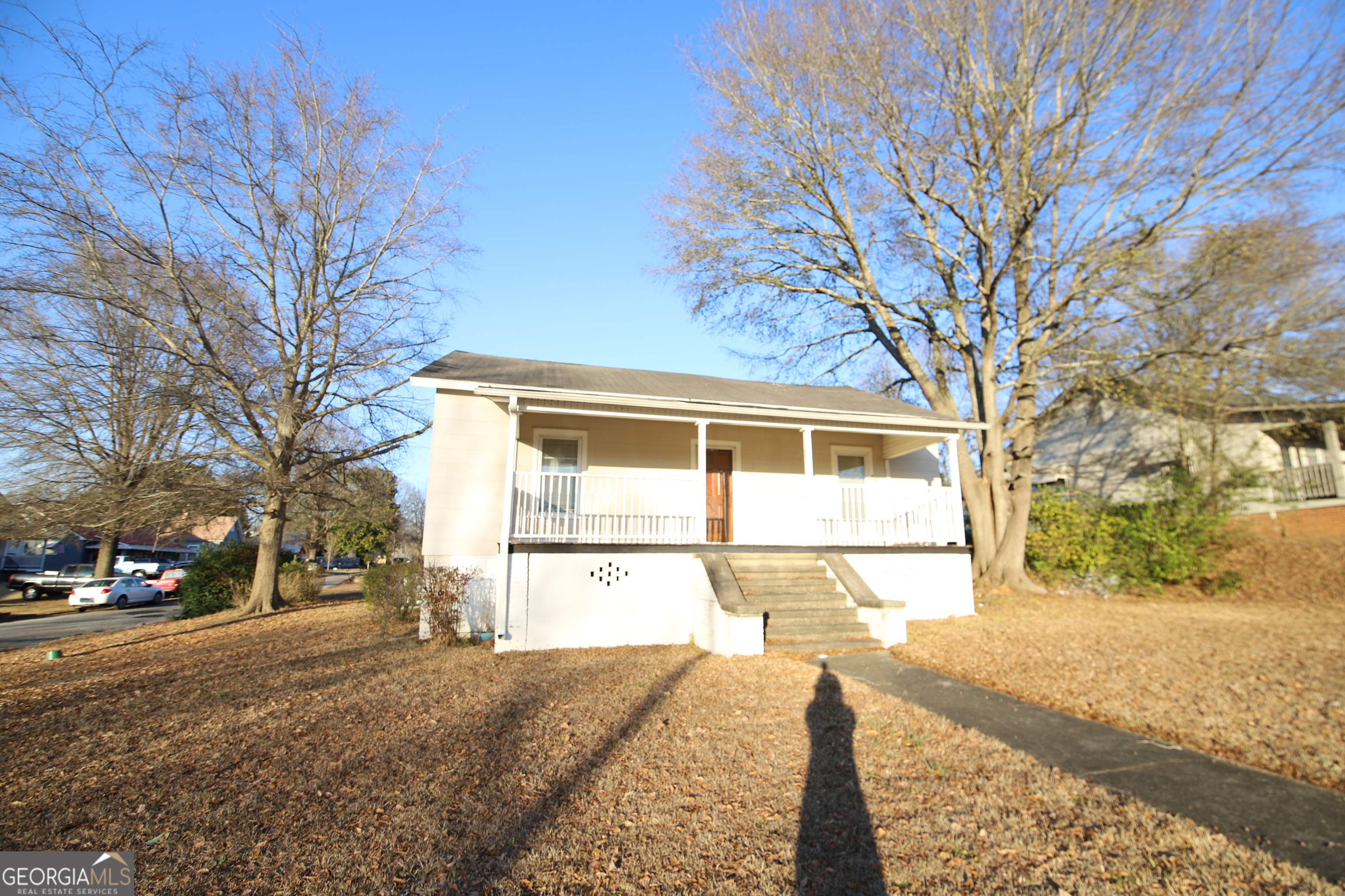 201 Jennings Street Valley, AL 36854 - Photo 6 of 24 a front view of a house with a yard and garage