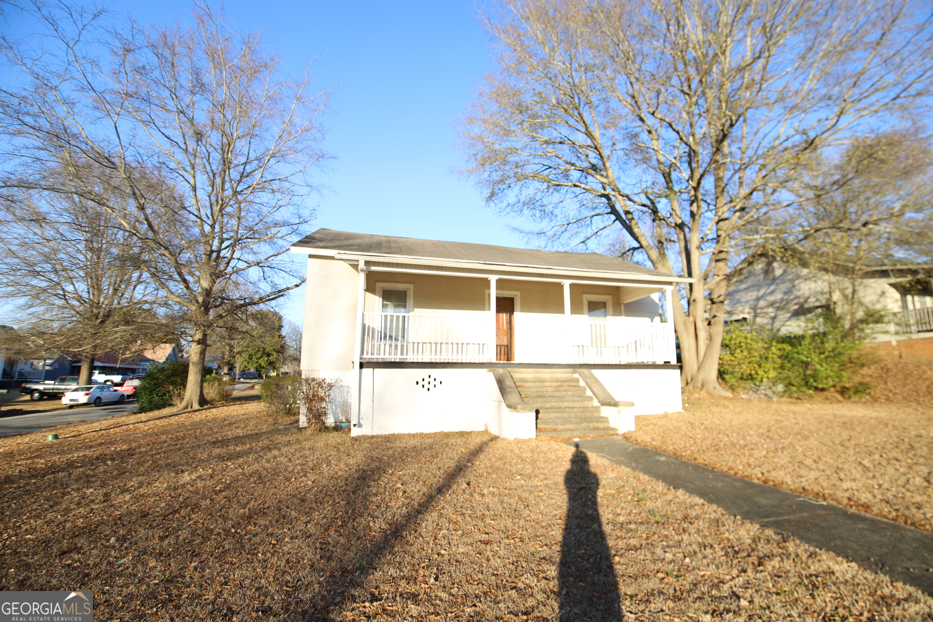 201 Jennings Street Valley, AL 36854 - Photo 7 of 24 a view of a house with a yard covered in snow