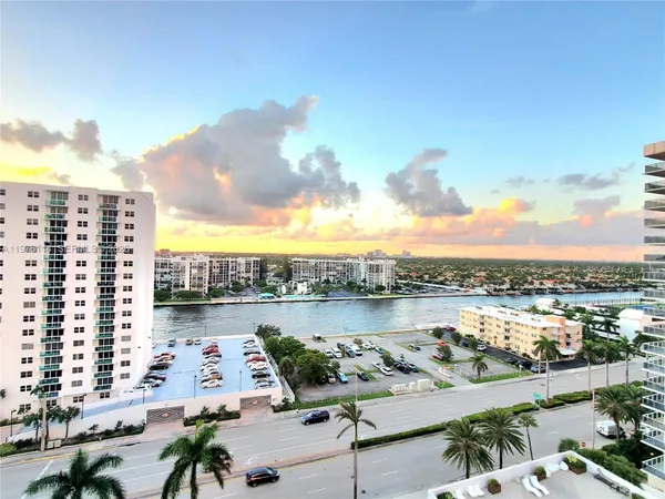 a view of a city with lawn chairs