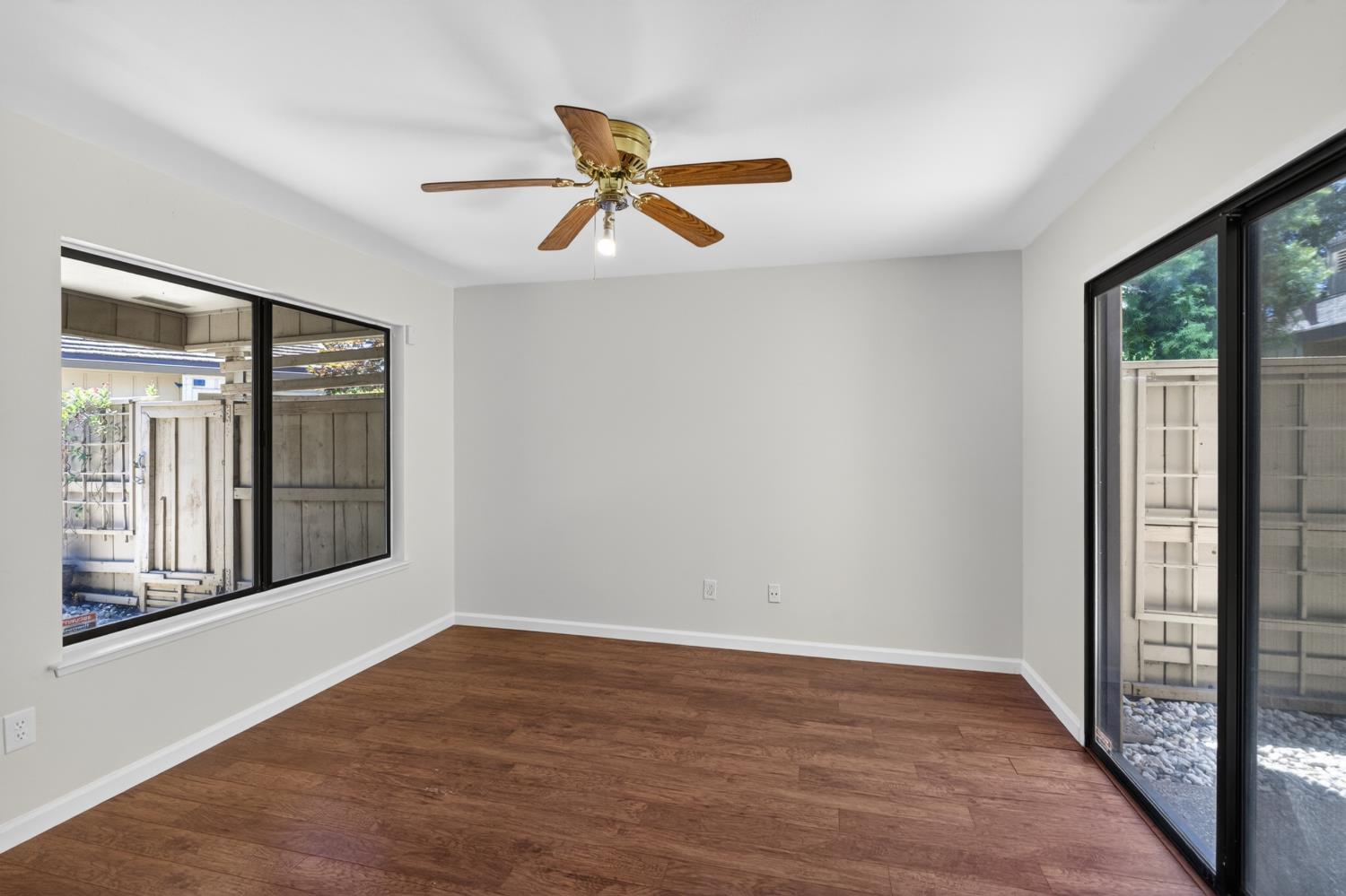 1338 Hunn Road, Unit 26 Yuba City, CA 95993 - Photo 34 of 58 Second Bedroom with Sliding Glass Door to Private Atrium