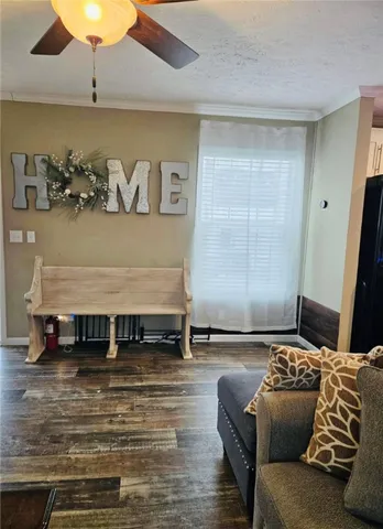 a bedroom with a bed and dresser