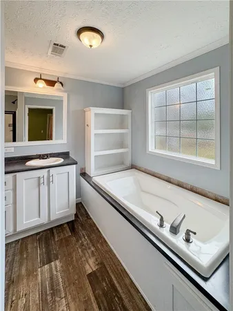 a living room with furniture stove and a window