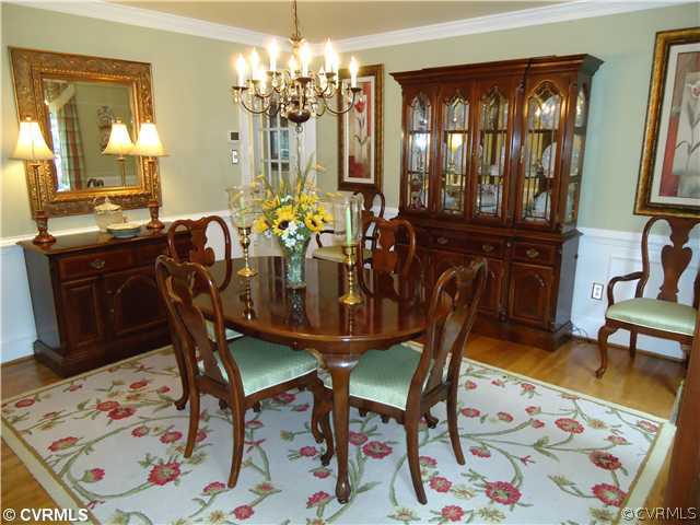 13906 Sunrise Bluff Road Midlothian, VA 23112 - Photo 5 of 12 a view of a dining room with furniture
