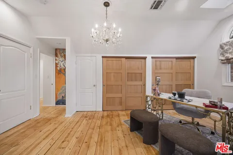 a work room with furniture and windows