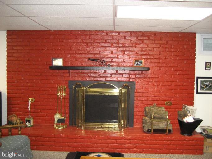 8122 Highpoint Road Curtis Bay, MD 21226 - Photo 11 of 22 FULL WALL BRICK FIREPLACE