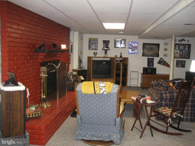 8122 Highpoint Road Curtis Bay, MD 21226 - Photo 12 of 22 LARGE FAMILY ROOM WITH NEW BERBER CARPET