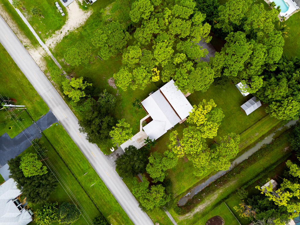 15733 Temple Boulevard Loxahatchee, FL 33470 - Photo 24 of 27 a view of a garden with plants