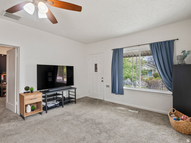 510 Canyon Road Ogden, UT 84404 - Photo 5 of 30 Living area featuring carpet flooring and ceiling fan