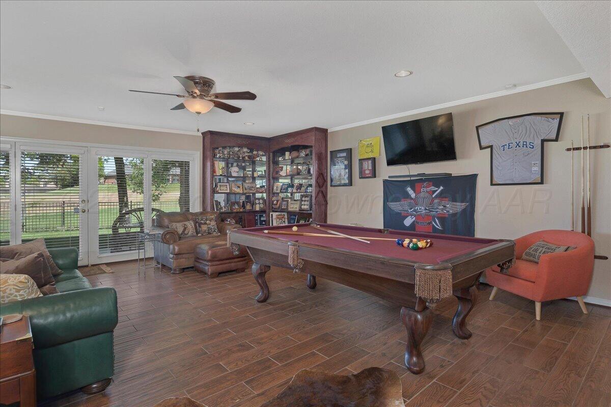 5 Locke Place Amarillo, TX 79124 - Photo 26 of 53 a living room with furniture and a flat screen tv