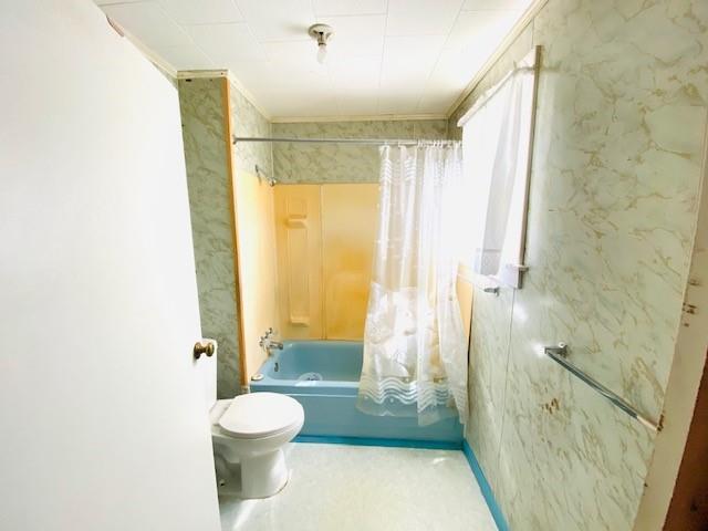 17731 East 2880 N Road Alvin, IL 61811 - Photo 14 of 17 a bathroom with a granite countertop shower a toilet and a shower