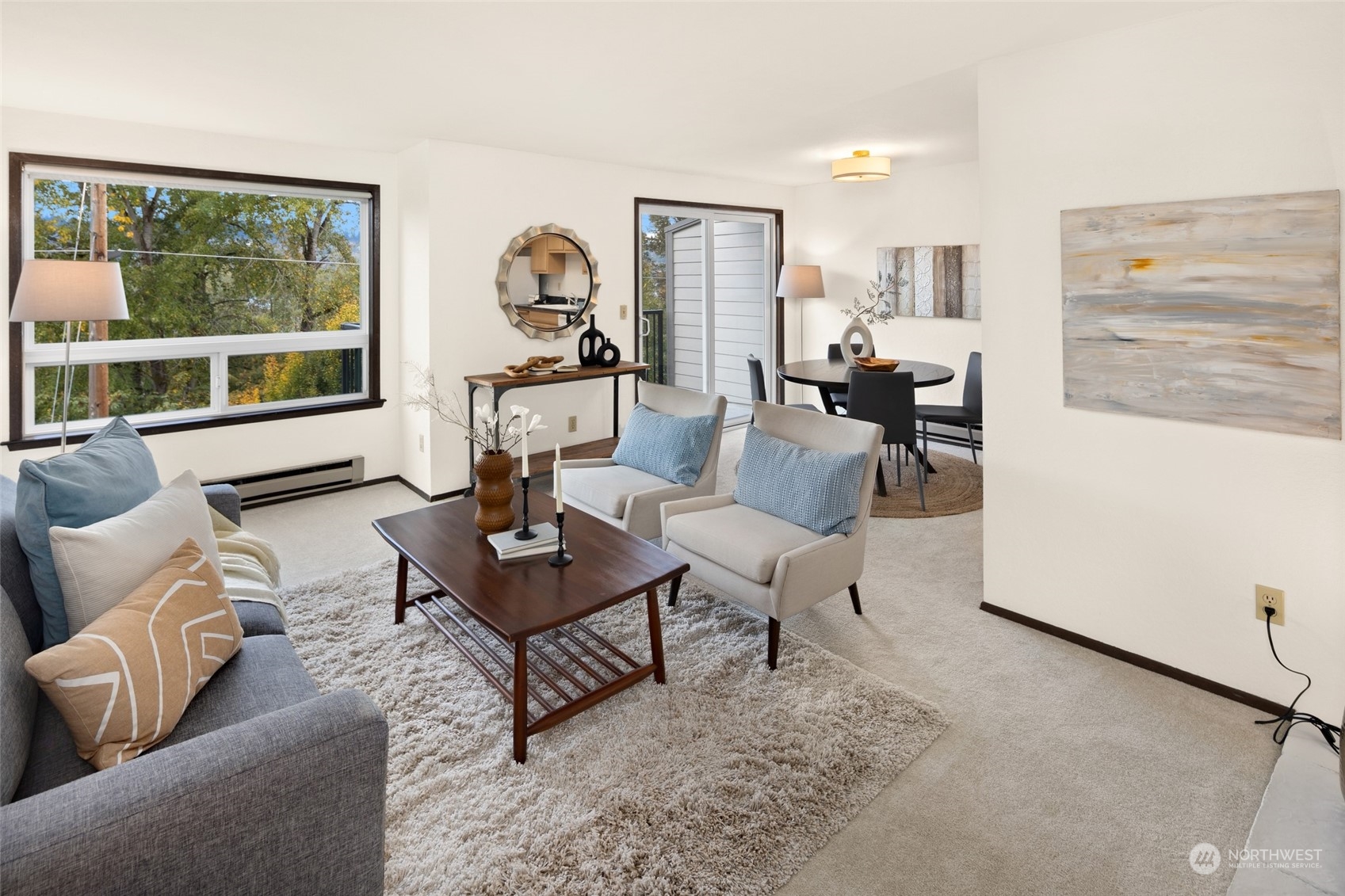 a living room with furniture and a table