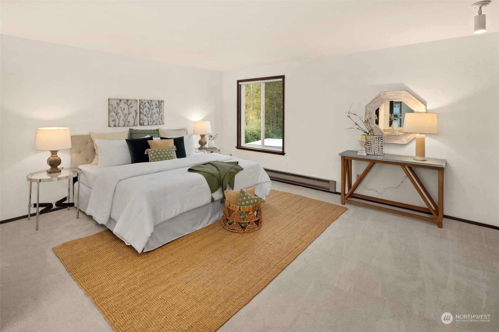 4100 Lake Washington Boulevard North, Unit A202 Renton, WA 98056 - Photo 12 of 25 a bedroom with bed and a night stand next to a window