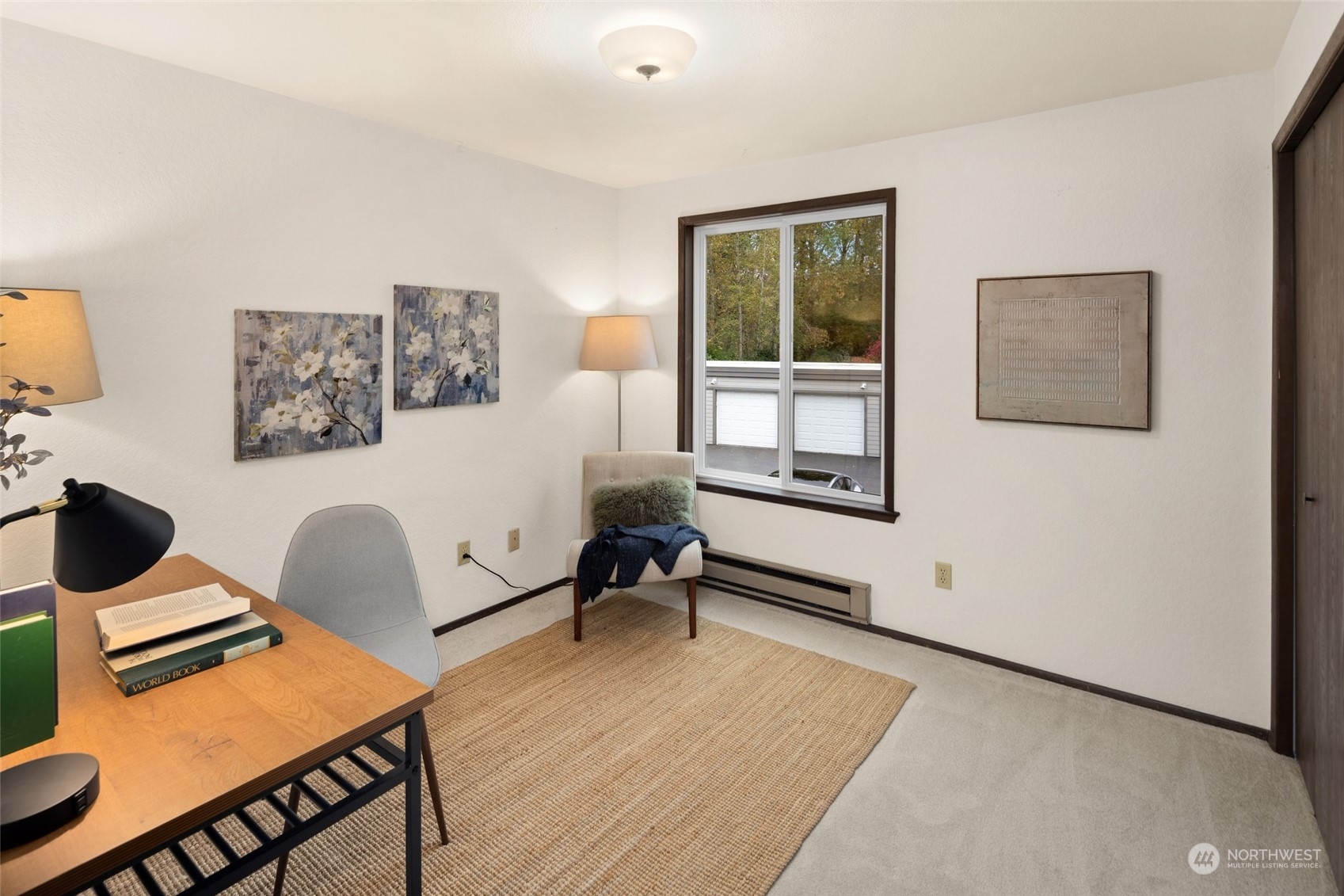 4100 Lake Washington Boulevard North, Unit A202 Renton, WA 98056 - Photo 16 of 25 a living room with furniture and a window