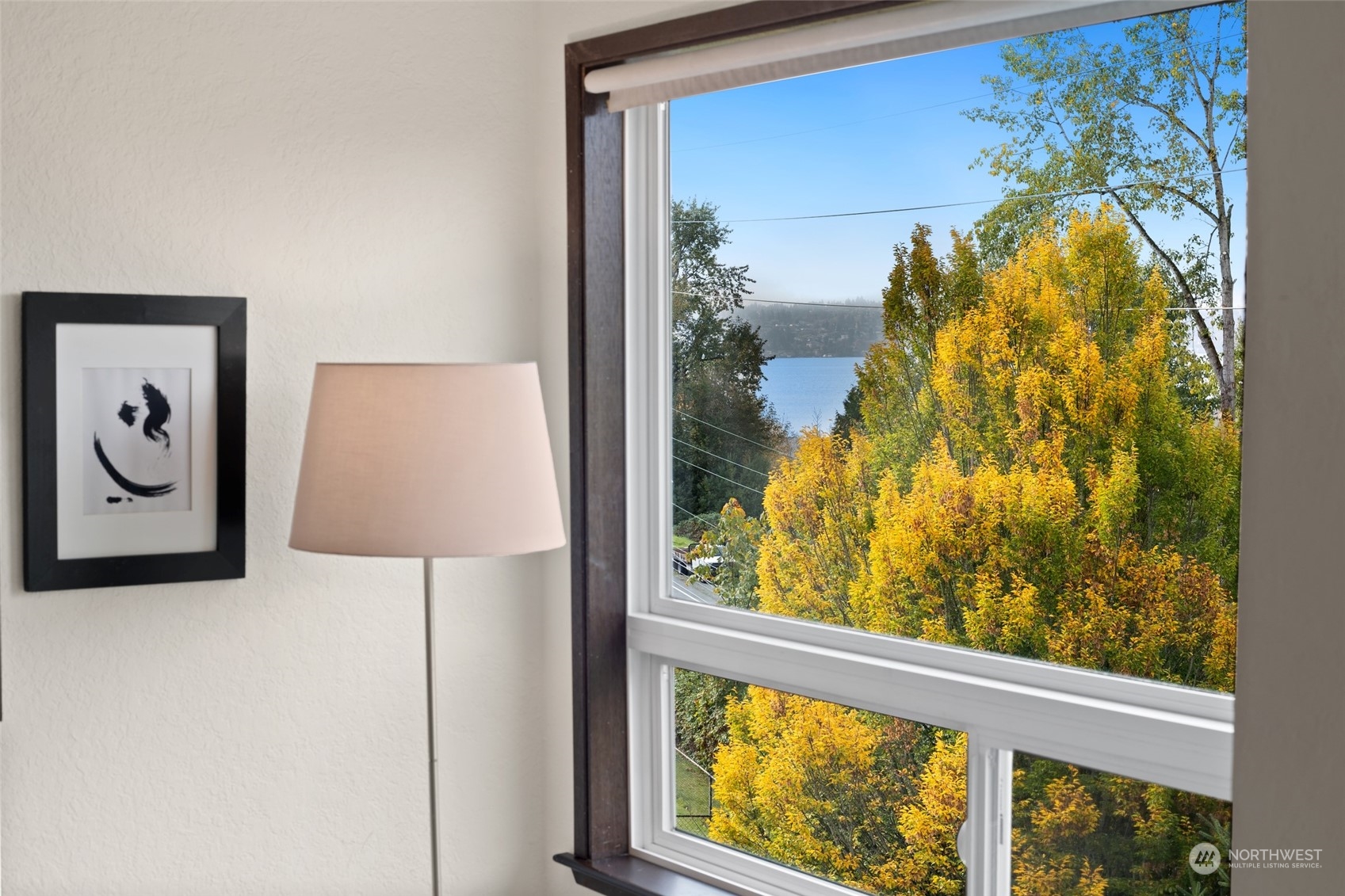 4100 Lake Washington Boulevard North, Unit A202 Renton, WA 98056 - Photo 3 of 25 a view of a painting on a wall