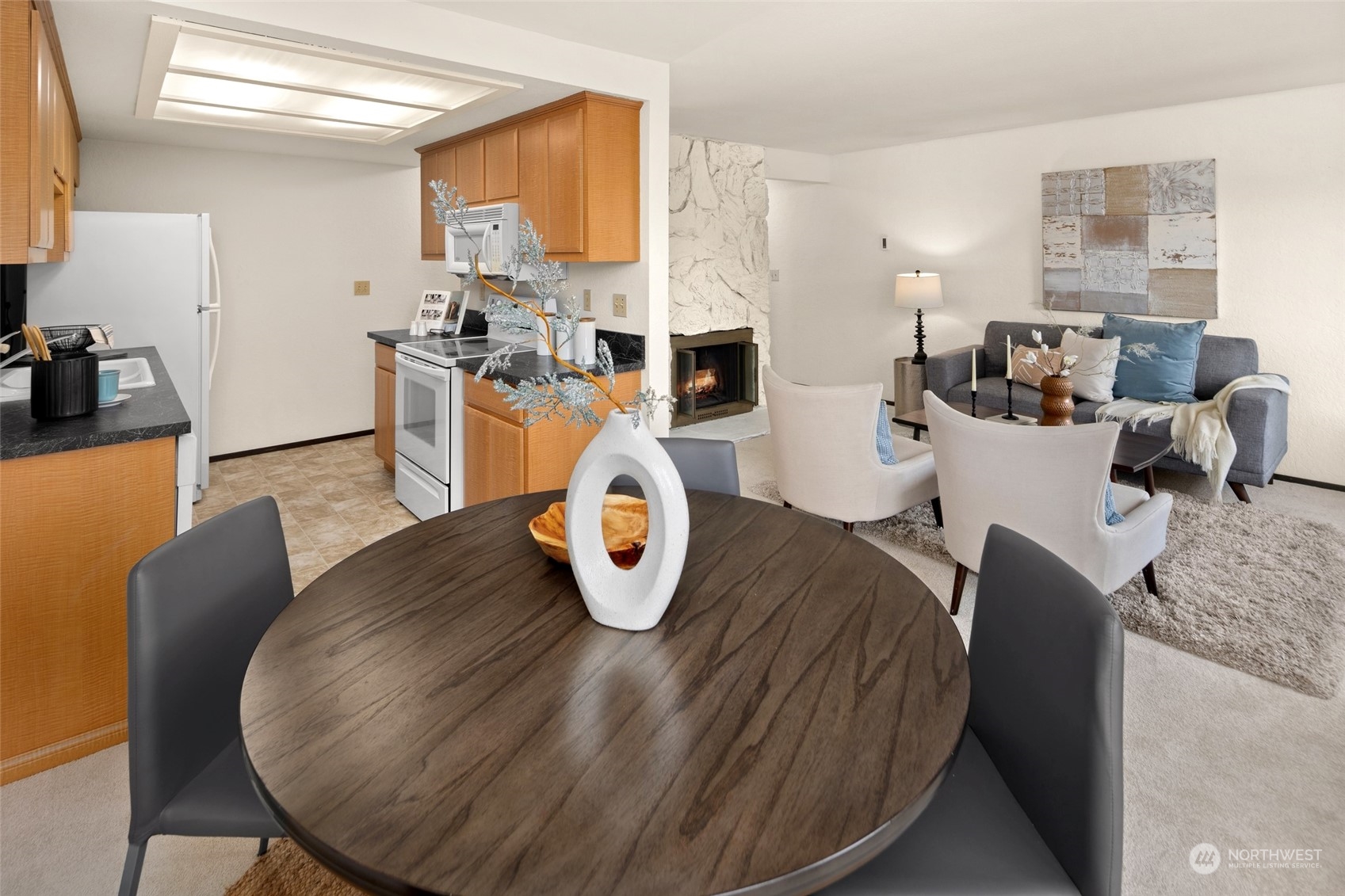4100 Lake Washington Boulevard North, Unit A202 Renton, WA 98056 - Photo 5 of 25 a living room with furniture and wooden floor