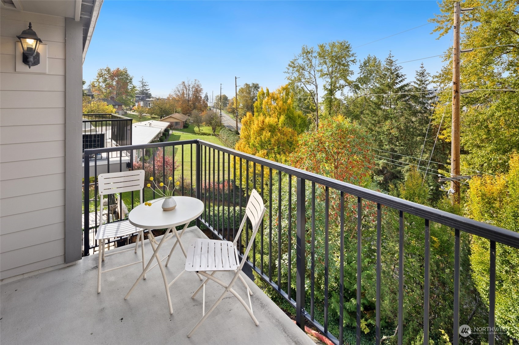 4100 Lake Washington Boulevard North, Unit A202 Renton, WA 98056 - Photo 7 of 25 a view of a balcony with chairs