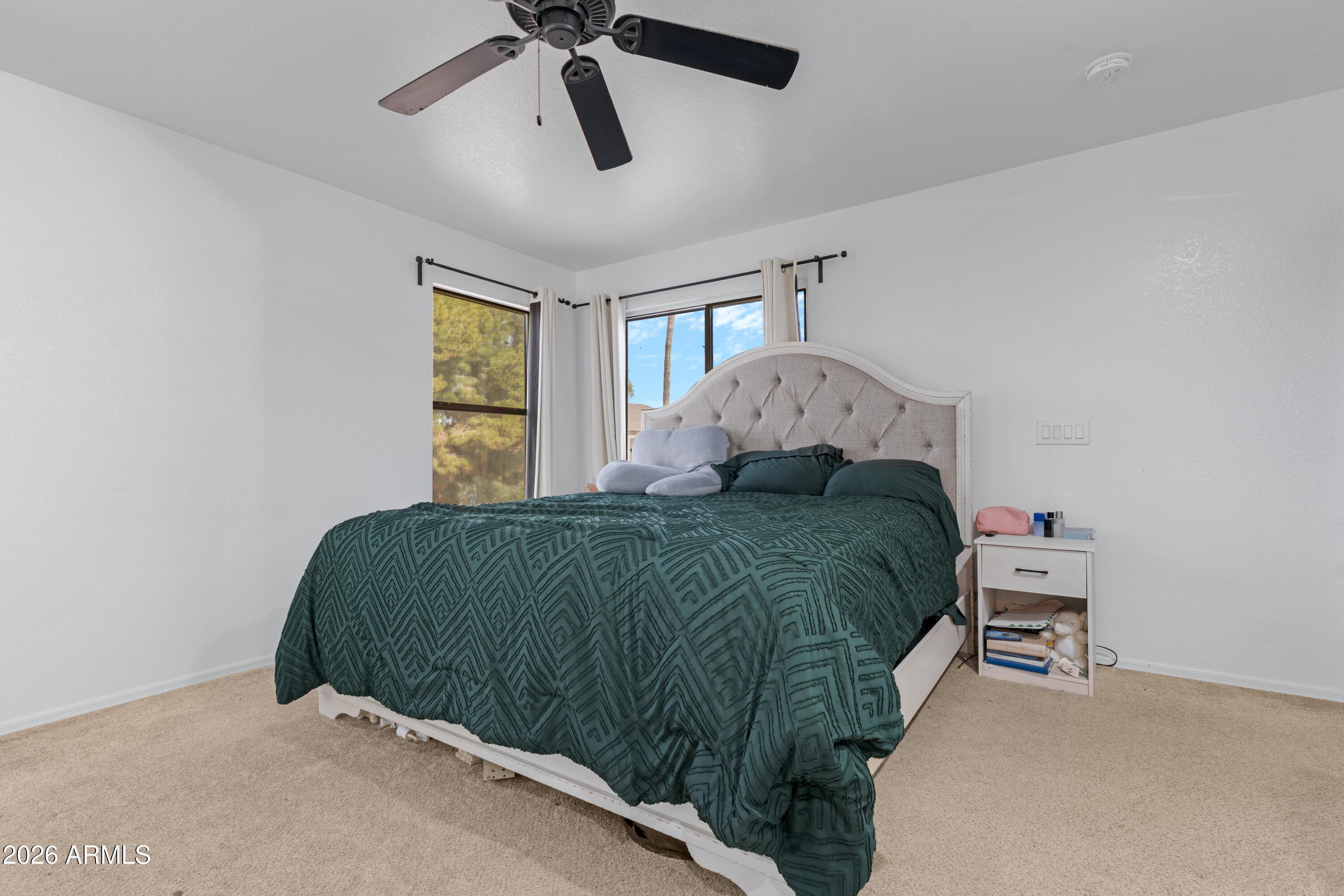 1810 East Milky Way Gilbert, AZ 85295 - Photo 19 of 46 a bedroom with a bed and window