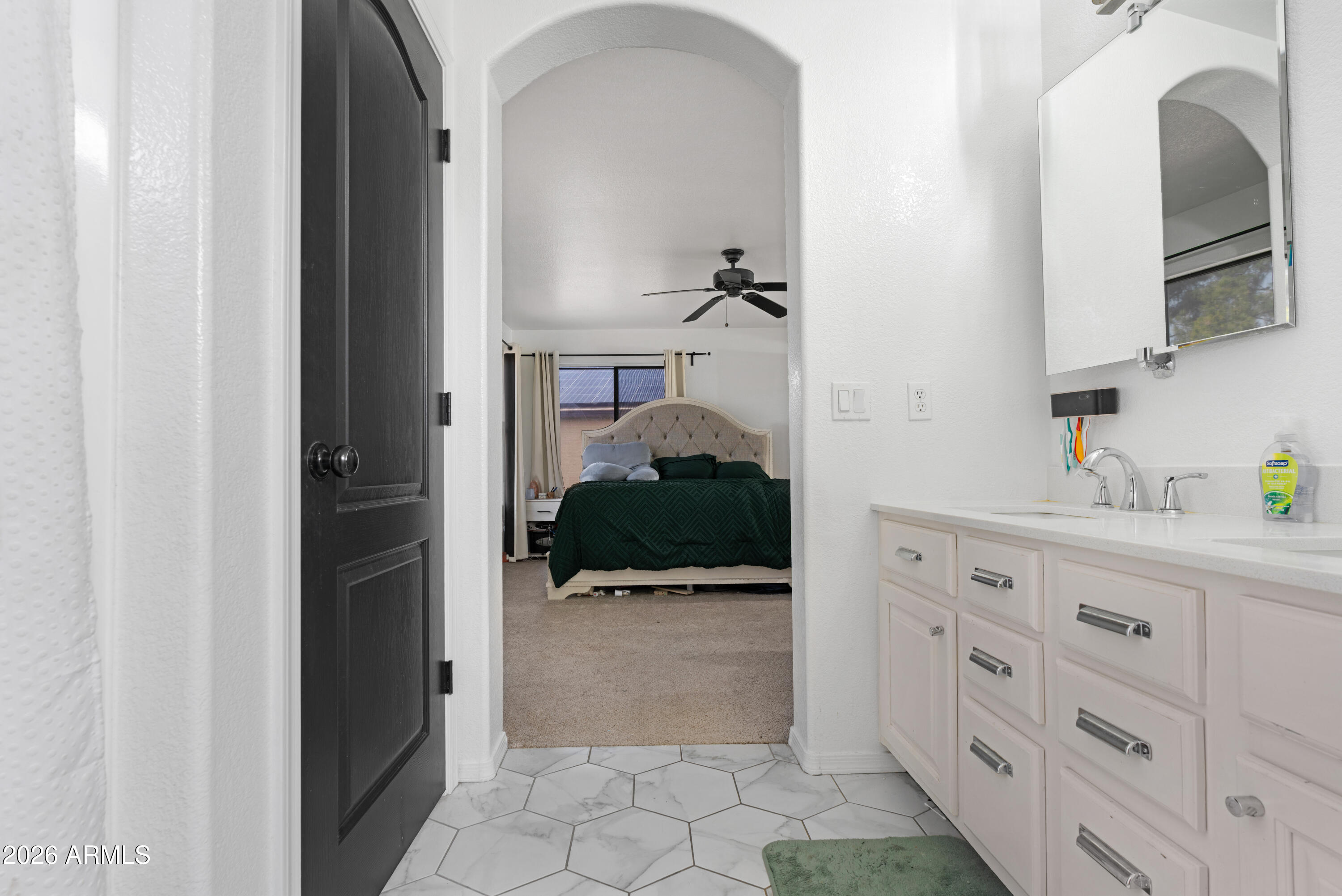 1810 East Milky Way Gilbert, AZ 85295 - Photo 24 of 46 a view of hallway with cabinets and a window